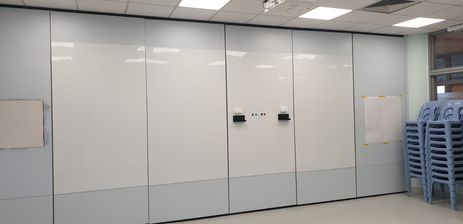 Magnetic whiteboard on hall partition walls